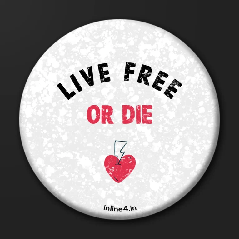 White speckled badge with "Live Free" in black and "Or Die" in red, above a hand-drawn heart struck by a lightning bolt