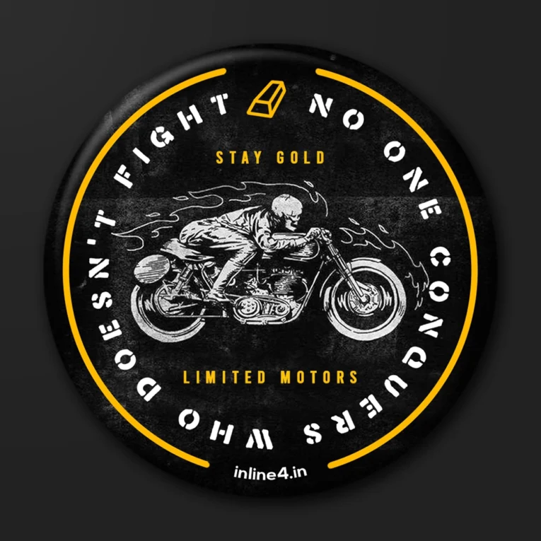 Black badge with a yellow ring, circular text reading "No One Conquers Who Doesn’t Fight," and a vintage illustration of a skeletal rider on a classic motorcycle trailing flames
