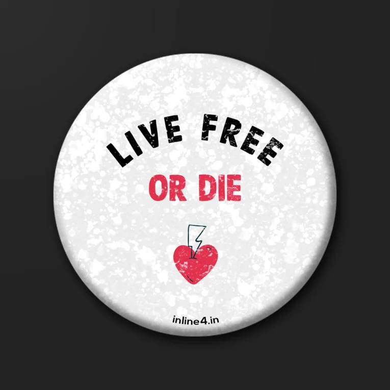 White speckled badge with "Live Free" in black and "Or Die" in red, above a hand-drawn heart struck by a lightning bolt