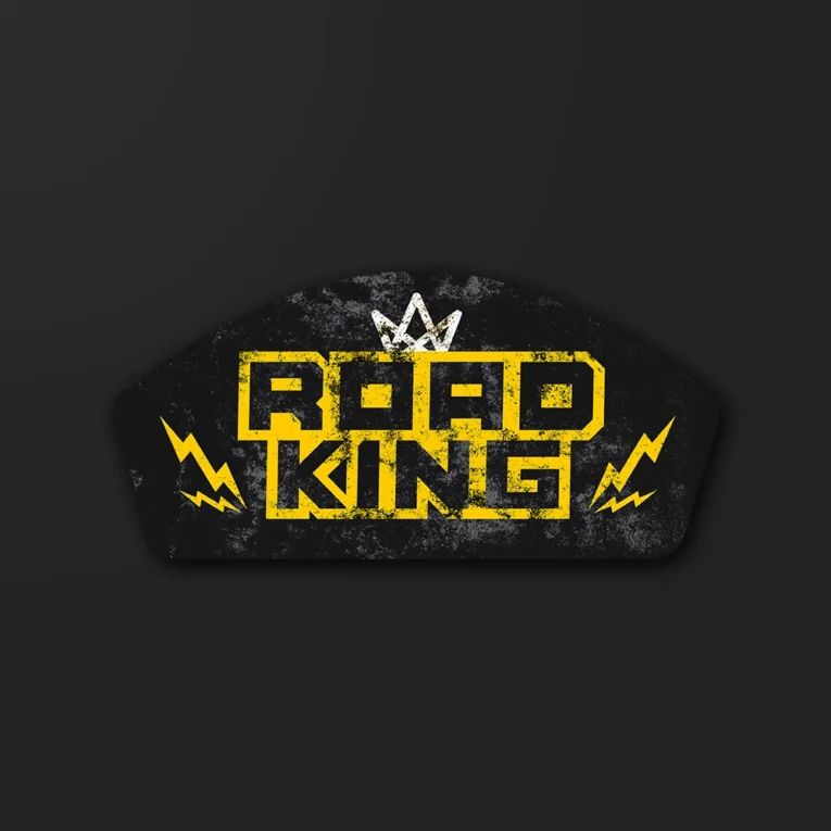 Inline-4 Road King sticker in bold yellow lettering with a crown icon and lightning bolts