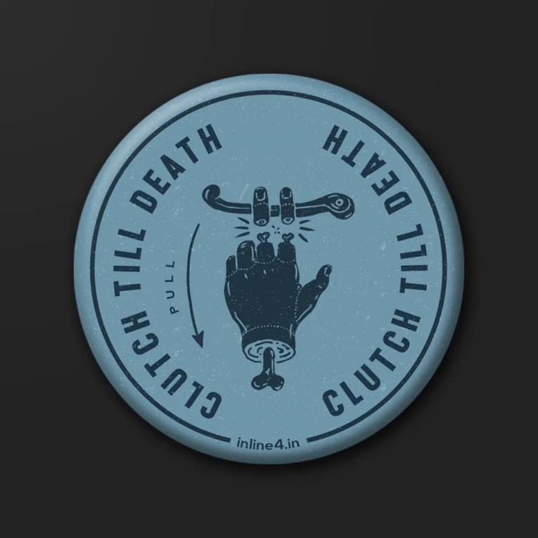 Light blue badge with an illustration of a hand pulling a motorcycle clutch lever, bold text reading "Clutch Till Death"