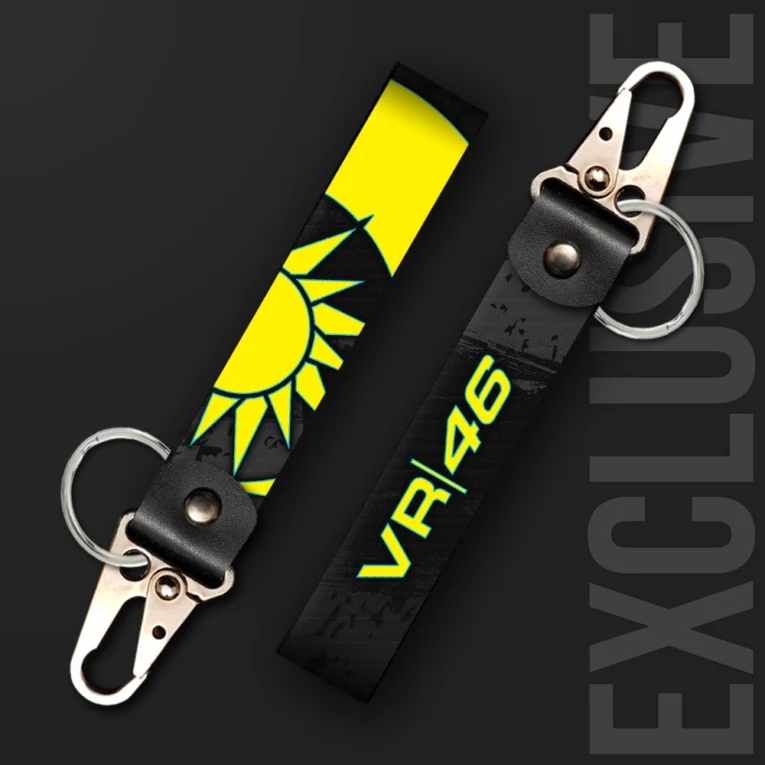 Inline-4 Sun & Moon keychain strap with a yellow sun graphic and 'VR|46' text on a black background, swivel hook clip + keyring