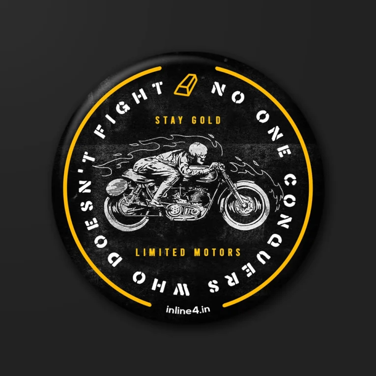 Black badge with a yellow ring, circular text reading "No One Conquers Who Doesn’t Fight," and a vintage illustration of a skeletal rider on a classic motorcycle trailing flames