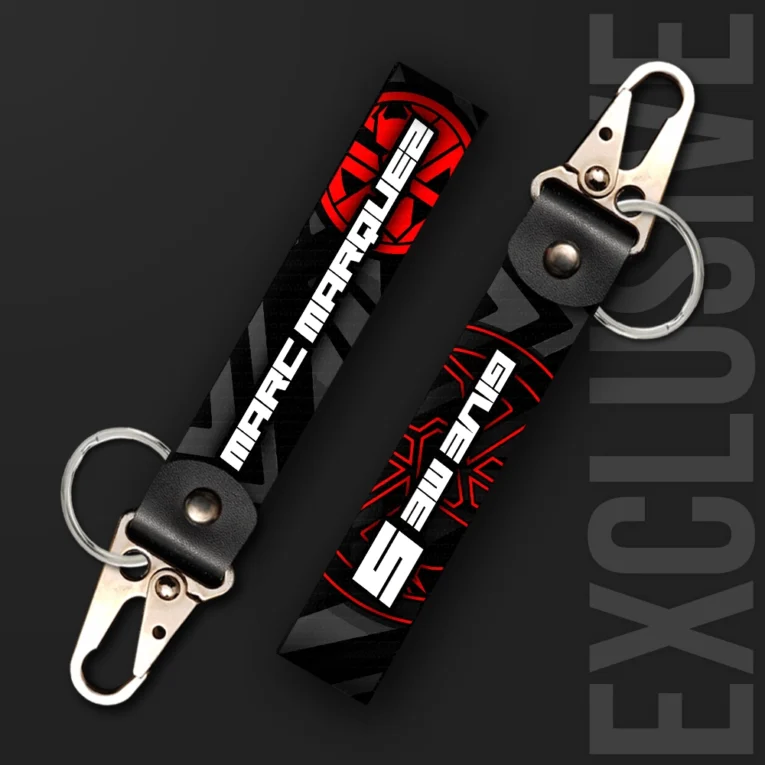 Inline-4 Give me 5 keychain strap with 'MARC MARQUEZ' text and a red spider-web graphic on black, swivel hook clip + keyring