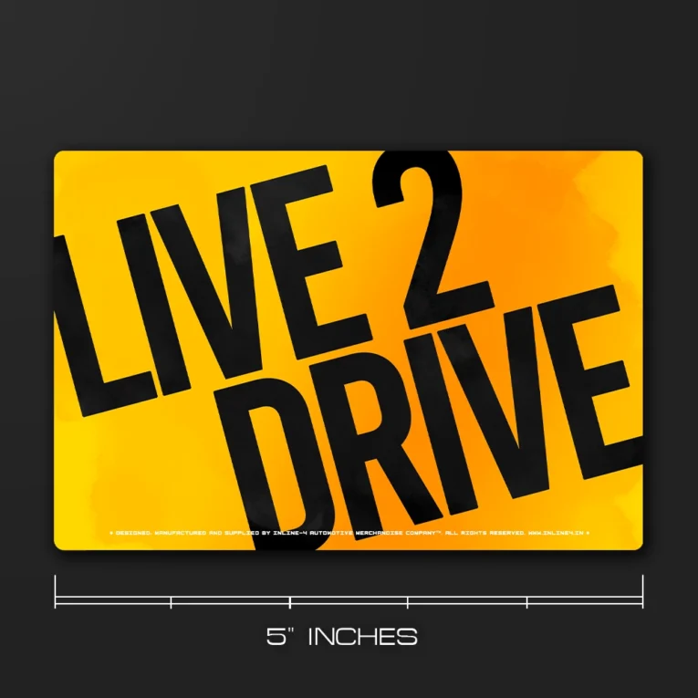 Inline-4 Live 2 Drive car sticker with bold black diagonal 'LIVE 2 DRIVE' text on a yellow-orange gradient background