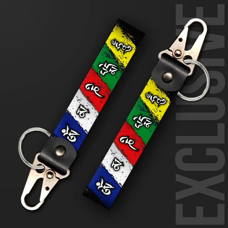 Inline-4 Ladakh Flag keychain strap with Tibetan prayer-flag colors and traditional script lettering, swivel hook clip + keyring