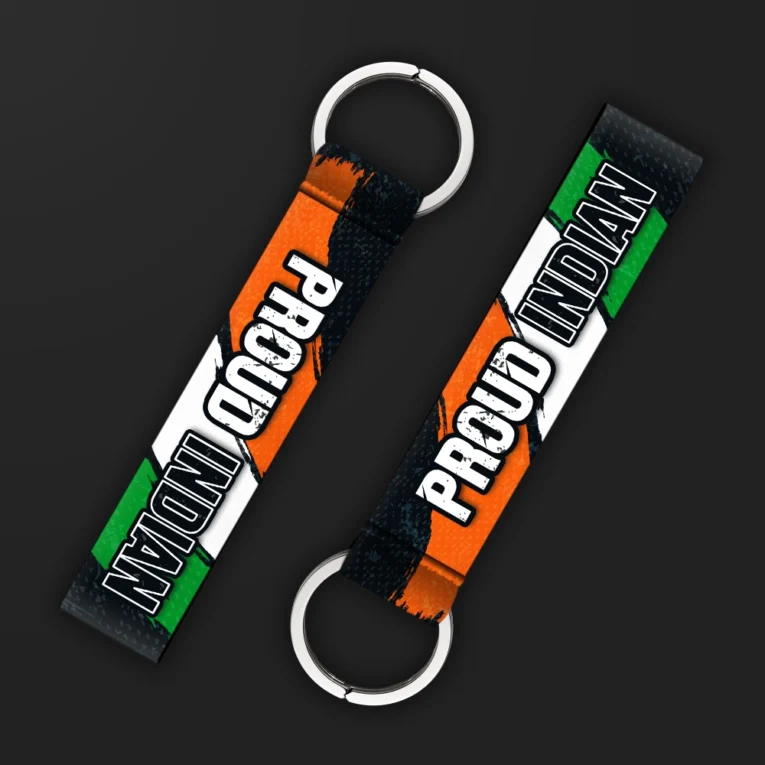 Inline-4 Proud Indian keychain strap with white 'PROUD INDIAN' text over the Indian tricolor flag background, double keyring