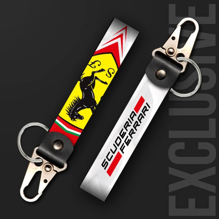 Inline-4 racing tribute keychain strap in Ferrari-inspired red and yellow with a prancing-horse-style crest graphic, swivel hook clip + keyring