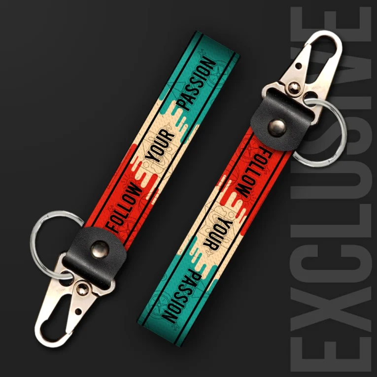 Inline-4 Follow your Passion keychain strap with a vintage teal and red ticket-style 'FOLLOW YOUR PASSION' design, swivel hook clip + keyring