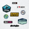Inline-4 Candida Louis 2.0 Sticker Set close-up, showing the Explorer badge, Symbol of Freedom badge, Solo Rider wordmark, and Race the Rain Ride the Wind banner
