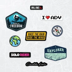 Inline-4 Candida Louis 2.0 Sticker Set close-up, showing the Explorer badge, Symbol of Freedom badge, Solo Rider wordmark, and Race the Rain Ride the Wind banner