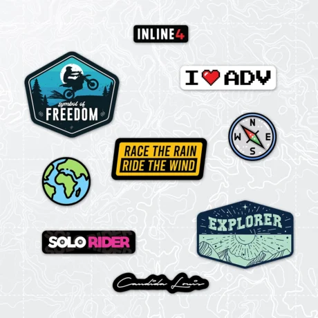 Inline-4 Candida Louis 2.0 Sticker Set close-up, showing the Explorer badge, Symbol of Freedom badge, Solo Rider wordmark, and Race the Rain Ride the Wind banner