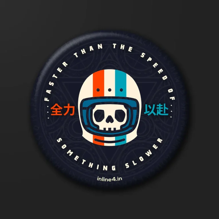 Speed of Light badge, a skull in a striped retro helmet with Japanese text on a navy ornamental badge